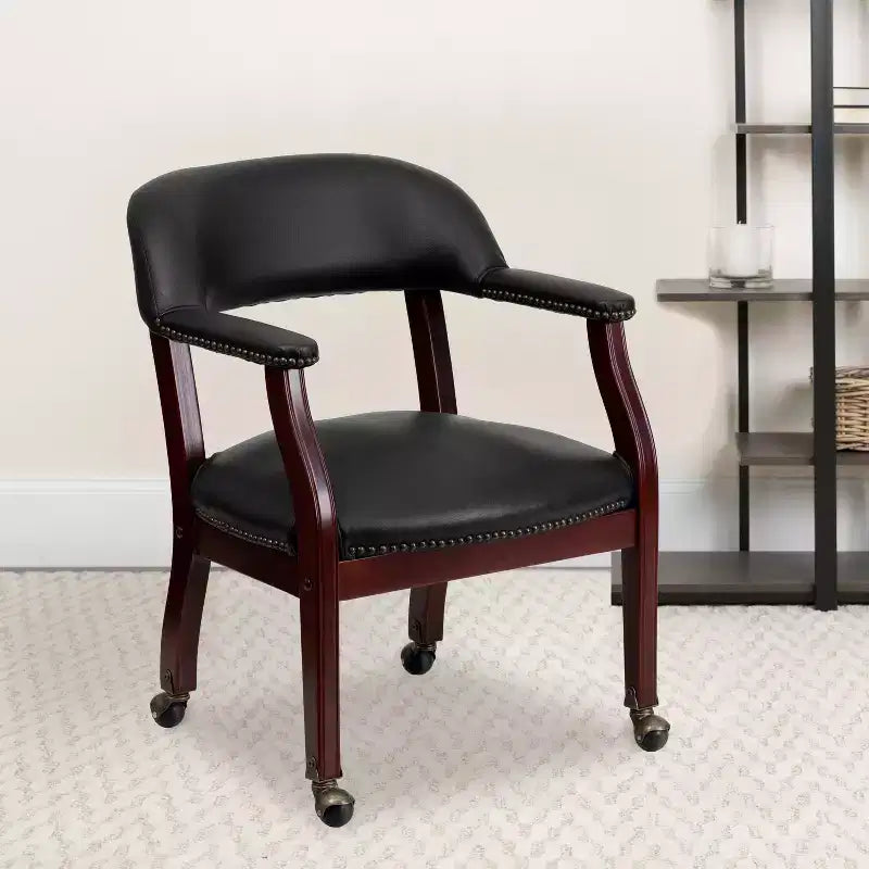 Black Vinyl Conference Chair with Nail Trim and Casters