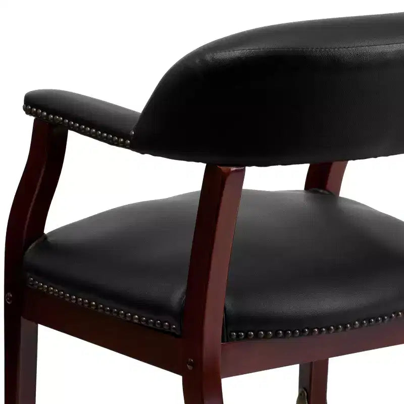Black Vinyl Conference Chair with Nail Trim and Casters