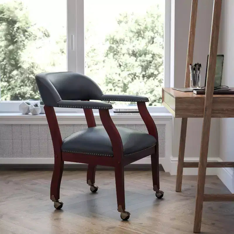 Black Vinyl Conference Chair with Nail Trim and Casters